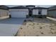 Modern one-story home with an attached garage and stone accents at 12631 Kelly Ann Loop, Brooksville, FL 34613