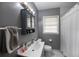 The bathroom has gray walls and a gray vanity at 12651 Tinley Rd, New Port Richey, FL 34654