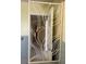The ornate bathroom features a decorative metal enclosure at 1450 Highfield Dr, Clearwater, FL 33764