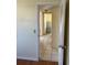 Hallway with tile floors and neutral walls at 1450 Highfield Dr, Clearwater, FL 33764