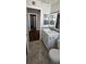 Bathroom features a single vanity and decorative mirror with tile accents at 1507 N Lake Dr, Sun City Center, FL 33573