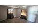 Bedroom boasts neutral walls, carpet flooring and natural light coming in from two windows at 1507 N Lake Dr, Sun City Center, FL 33573