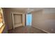 Spacious bedroom boasts neutral walls and carpet flooring at 1507 N Lake Dr, Sun City Center, FL 33573