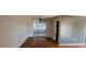 Neutral living area with sliding door leading to a porch at 1507 N Lake Dr, Sun City Center, FL 33573