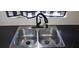 Close-up of the kitchen sink, highlighting the modern faucet and clean design at 1507 N Lake Dr, Sun City Center, FL 33573