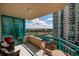 Condo balcony with seating overlooking the city with views of the water at 1520 Gulf Blvd # 805, Clearwater Beach, FL 33767