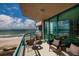 Condo balcony boasts stunning ocean views, comfortable seating and offers a relaxing outdoor space at 1520 Gulf Blvd # 805, Clearwater Beach, FL 33767