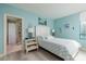 Cozy bedroom features a queen bed, stylish decor, and an en-suite bathroom with a shower at 1520 Gulf Blvd # 805, Clearwater Beach, FL 33767