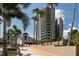 Elegant beachfront condos framed by lush palm trees and landscaped grounds at 1520 Gulf Blvd # 805, Clearwater Beach, FL 33767