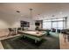 Spacious game room with pool tables and ample seating for entertaining at 1520 Gulf Blvd # 805, Clearwater Beach, FL 33767