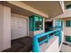 Condo hallway featuring unit entrance with double doors and a small sitting area with windows at 1520 Gulf Blvd # 805, Clearwater Beach, FL 33767