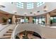 Grand lobby with staircase, featuring a modern design and natural light at 1520 Gulf Blvd # 805, Clearwater Beach, FL 33767