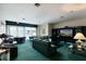 Cozy lounge area with comfortable couches and a large TV screen at 1520 Gulf Blvd # 805, Clearwater Beach, FL 33767