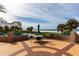 Outdoor dining area with patio seating and a beautiful view of the beach and ocean at 1520 Gulf Blvd # 805, Clearwater Beach, FL 33767