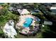 Aerial view of the community pool, playground, and lounge areas at 1648 Mira Lago Cir, Ruskin, FL 33570