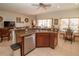 Kitchen with stainless steel appliances, a breakfast bar, and an open design at 1648 Mira Lago Cir, Ruskin, FL 33570