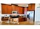 Kitchen with stainless steel appliances and countertops, lots of cabinet space at 1648 Mira Lago Cir, Ruskin, FL 33570