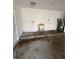 Garage area featuring a utility sink, providing practicality for various cleaning and maintenance tasks at 1982 Seton Dr, Clearwater, FL 33763