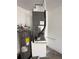 Water heater and HVAC equipment with visible connections, ensuring efficient water heating and climate control at 1982 Seton Dr, Clearwater, FL 33763