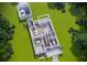 Open-concept floor plan showcasing spacious living areas, a modern kitchen, and a detached two-car garage at 2402 N Glenwood Dr, Tampa, FL 33602
