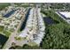 Charming community with well-maintained homes, lush landscaping and water views from this scenic aerial perspective at 284 Hemingway Dr, Oldsmar, FL 34677