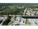 A lush landscape surrounds this community, with canals, ponds, and greenery offering peaceful views at 284 Hemingway Dr, Oldsmar, FL 34677