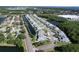 Aerial view of an expansive neighborhood featuring lush landscapes and winding waterways for a scenic living experience at 284 Hemingway Dr, Oldsmar, FL 34677