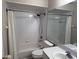 Bathroom featuring a shower and tub combo, toilet, and single sink vanity at 284 Hemingway Dr, Oldsmar, FL 34677