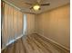 Cozy bedroom with luxury vinyl plank flooring, recessed lighting, and neutral paint at 284 Hemingway Dr, Oldsmar, FL 34677
