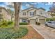 Front exterior of home featuring a well-maintained lawn and landscaping at 3131 Royal Tuscan Ln, Valrico, FL 33594