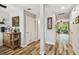 Open hallway features wood-look flooring and a beverage station, flowing into the light-filled living area at 3406 Cypress Head Ct, Tampa, FL 33618