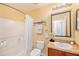 Traditional bathroom with a shower and tub combination with a granite counter at 4405 Tuscan Loon Dr, Tampa, FL 33619
