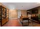 Spacious office with built-in shelves, hardwood floors and a wooden desk at 4405 Tuscan Loon Dr, Tampa, FL 33619