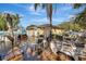 A spacious wooden deck and pool area, with plenty of seating, are perfect for outdoor entertaining at 4716 Gazania St, New Port Richey, FL 34652