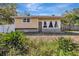 Charming one-story home with a large front window and stone accents at 4716 Gazania St, New Port Richey, FL 34652