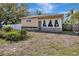 Charming one-story home with a large front window and stone accents at 4716 Gazania St, New Port Richey, FL 34652