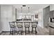 Stylish kitchen with a breakfast bar offering views into the adjacent living space at 4716 Gazania St, New Port Richey, FL 34652