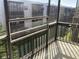 Balcony overlooking well-maintained green spaces and the rest of the complex at 5971 Terrace Park N Dr # 310, St Petersburg, FL 33709