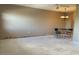 Open-concept living room featuring a ceiling fan and space for a dining area at 5971 Terrace Park N Dr # 310, St Petersburg, FL 33709