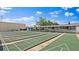 Shuffleboard courts in a community setting with benches and covered seating at 5971 Terrace Park N Dr # 310, St Petersburg, FL 33709