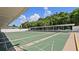 Outdoor shuffleboard courts with benches and covered seating area at 5971 Terrace Park N Dr # 310, St Petersburg, FL 33709