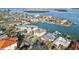 Impressive aerial showcases waterfront homes and neighborhood, nestled along tranquil waterways at 750 123Rd Ave, Treasure Island, FL 33706