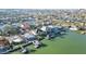 Lovely aerial view of waterfront homes with docks and pools in the desirable coastal community at 750 123Rd Ave, Treasure Island, FL 33706