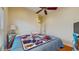 Bright bedroom features stylish design elements and comfortable furnishing at 750 123Rd Ave, Treasure Island, FL 33706