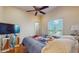 Bright bedroom features stylish design elements and comfortable furnishing at 750 123Rd Ave, Treasure Island, FL 33706