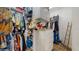 A spacious walk-in closet featuring custom shelving, drawers, and ample storage space for clothing at 750 123Rd Ave, Treasure Island, FL 33706