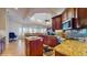 Bright kitchen featuring an island, granite countertops, a breakfast bar, and stainless steel appliances at 750 123Rd Ave, Treasure Island, FL 33706