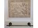 Wall decor features bas relief artwork depicting ocean scene with palms and coastal birds at 750 123Rd Ave, Treasure Island, FL 33706
