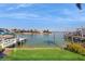 Expansive waterfront view featuring docks and calm waters, perfect for boating enthusiasts and serene living at 750 123Rd Ave, Treasure Island, FL 33706