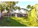Well maintained backyard with a storage shed and a wood fence at 7990 42Nd N St, Pinellas Park, FL 33781
